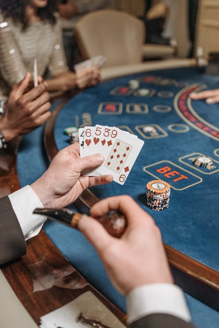 Blackjack table with blue lighting and players