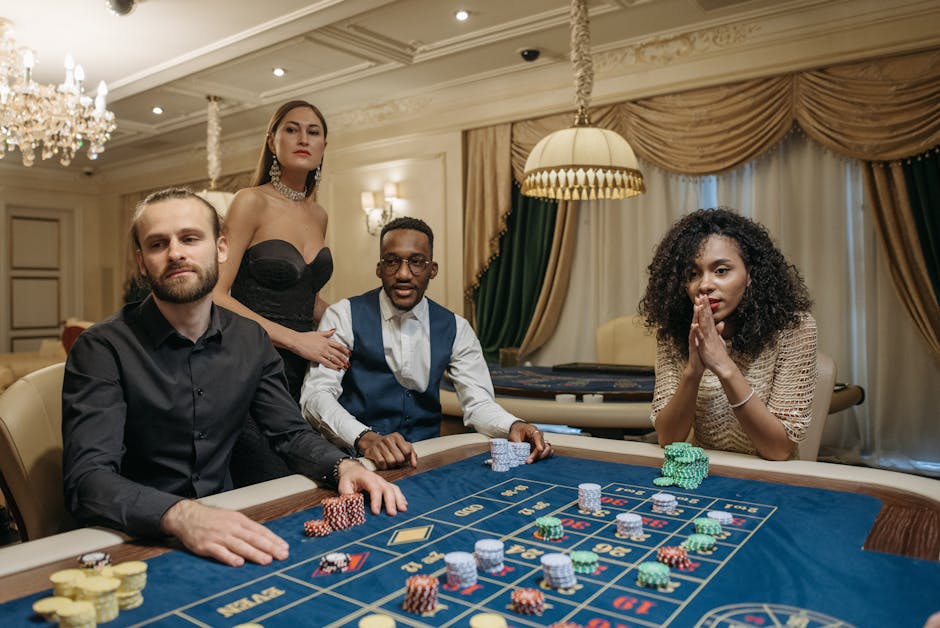 Roulette table with blue lighting and players