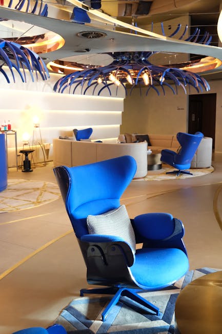 VIP lounge with blue lighting and luxury seating
